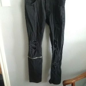 Destressed black jeans